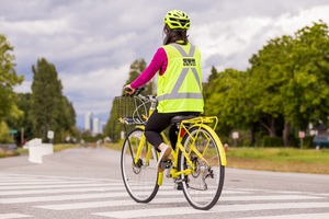 YVR - Bicycle Valet - girl on bike PHOTO YVR - Bicycle Valet - girl on bike PHOTO